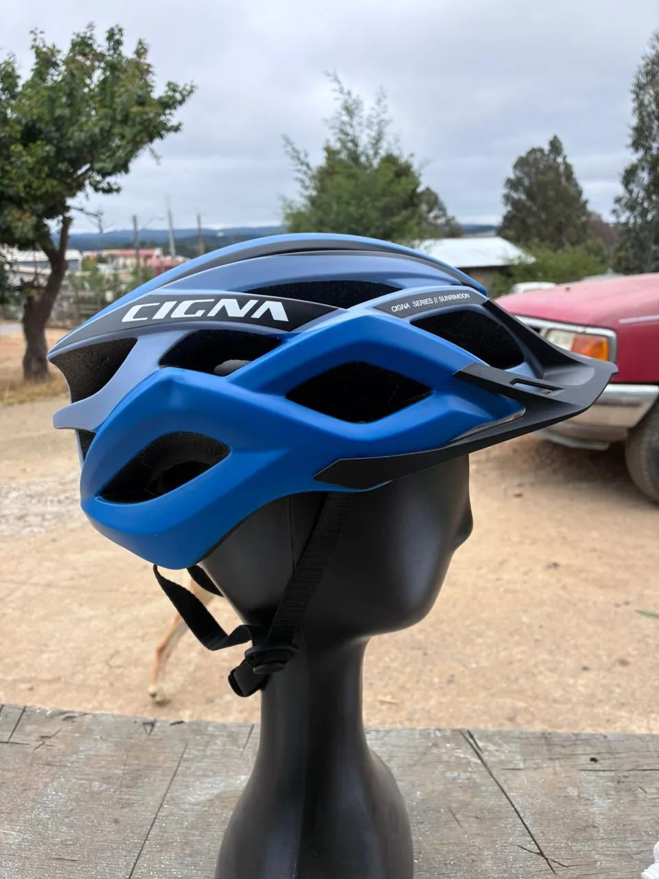 casco cigna negro azul